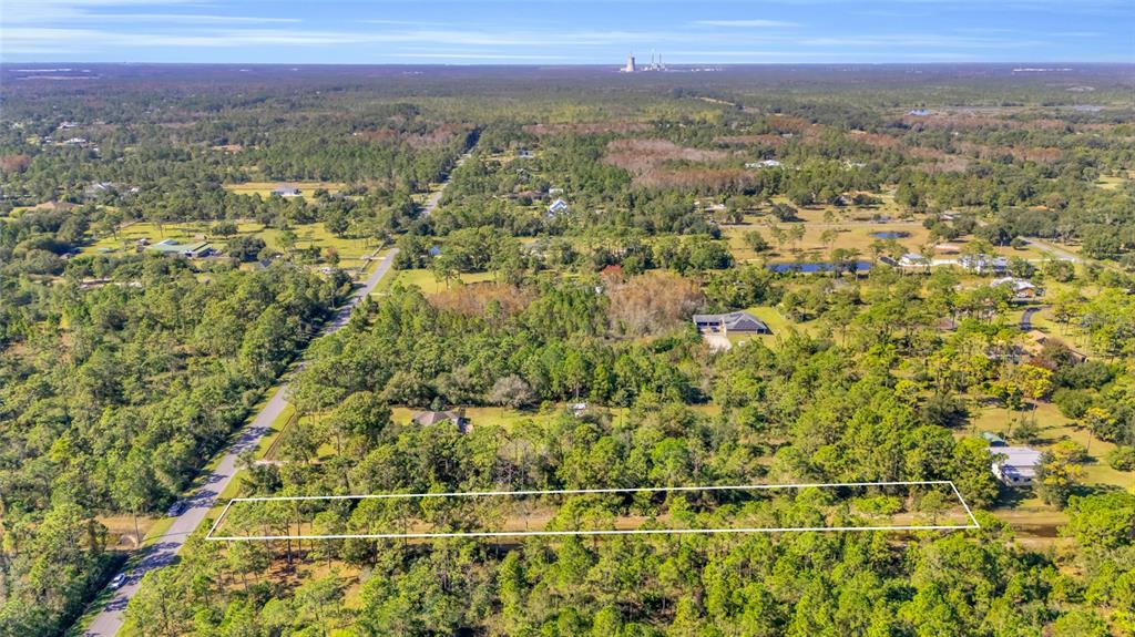 Quinlan Street Orlando, FL 32833 - Photo 17 of 40 a view of a city with lush green forest