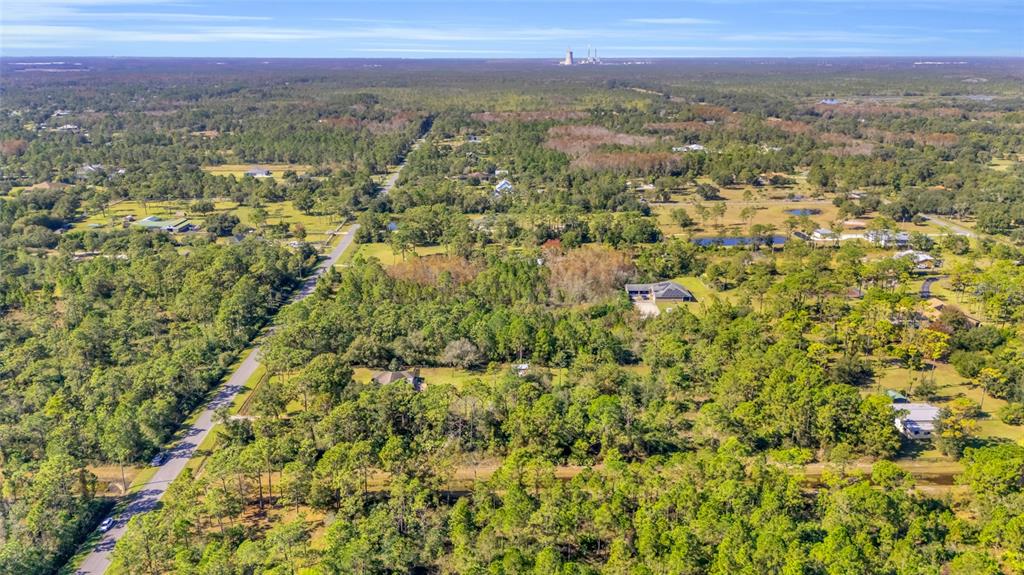 Quinlan Street Orlando, FL 32833 - Photo 18 of 40 a view of a city with lush green forest