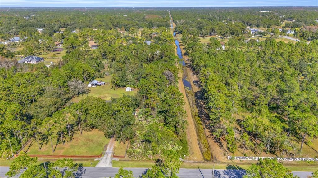 Quinlan Street Orlando, FL 32833 - Photo 6 of 40 a view of a city with lush green forest