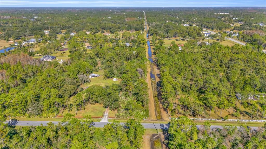 Quinlan Street Orlando, FL 32833 - Photo 8 of 40 a view of a lake with a city view