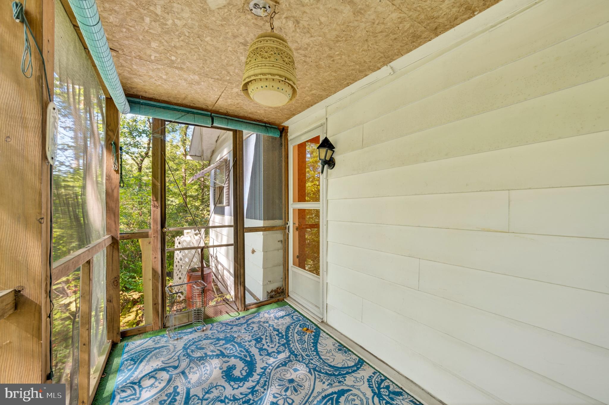 1951 Quarry Road Quakertown, PA 18951 - Photo 23 of 35 Serene screened porch with nature views.