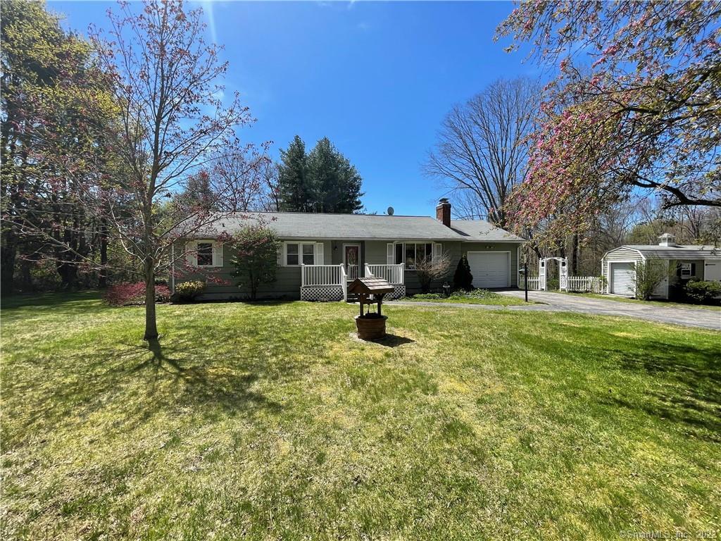 129 Buckley Hill Road Thompson, CT 06255 - Photo 1 of 1 a front view of a house with a yard