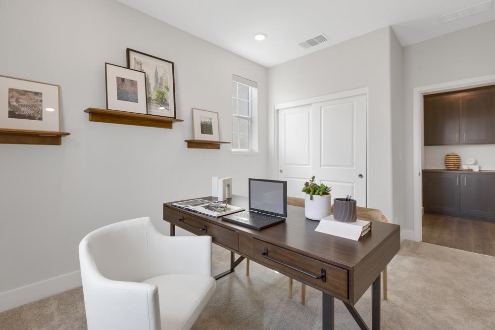 8435 Kyler Road Elk Grove, CA 95757 - Photo 30 of 56 a view of a dining room with furniture