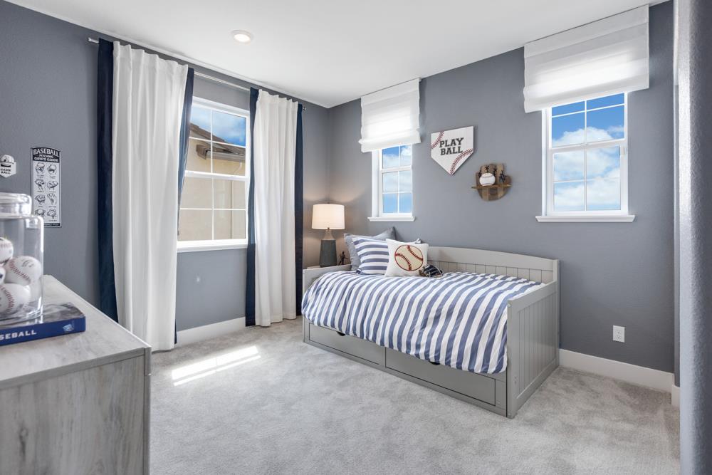 8435 Kyler Road Elk Grove, CA 95757 - Photo 31 of 56 a bedroom with a bed and a window