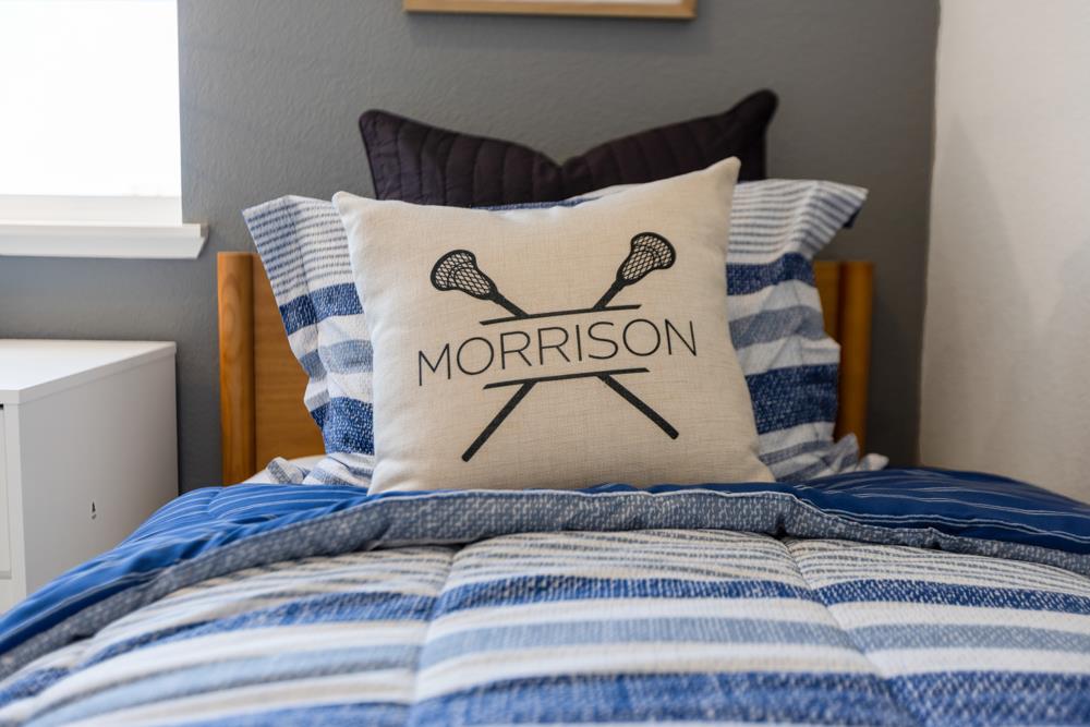 8435 Kyler Road Elk Grove, CA 95757 - Photo 35 of 56 a bedroom with a bed and wooden floor