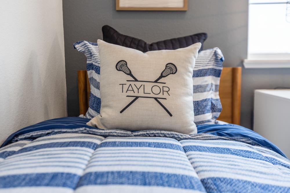 8435 Kyler Road Elk Grove, CA 95757 - Photo 36 of 56 a bedroom with a bed and wooden floor