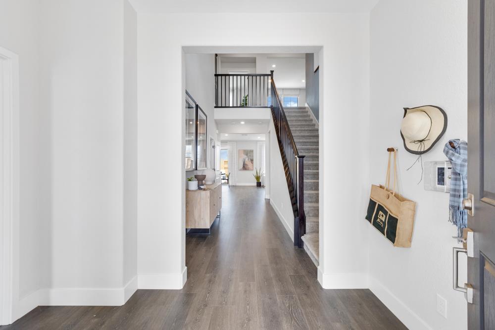 8435 Kyler Road Elk Grove, CA 95757 - Photo 40 of 56 a view of hallway with wooden floor