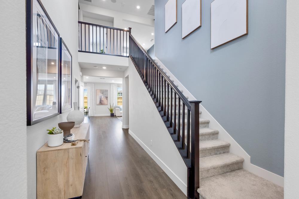 8435 Kyler Road Elk Grove, CA 95757 - Photo 41 of 56 a view of entryway and hall with wooden floor
