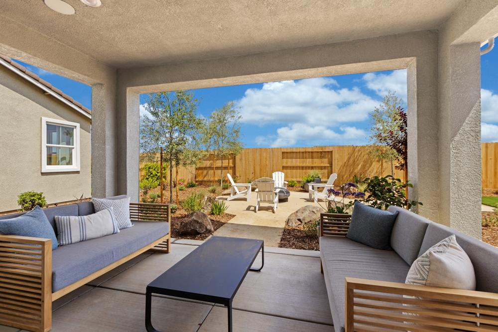 8435 Kyler Road Elk Grove, CA 95757 - Photo 48 of 56 a living room with furniture and a large window