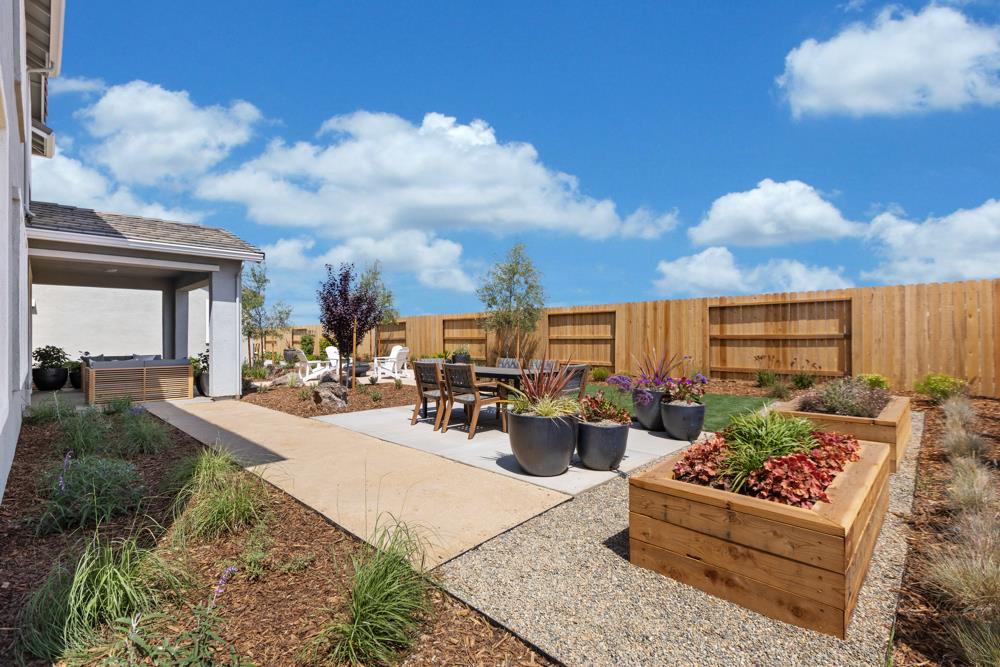 8435 Kyler Road Elk Grove, CA 95757 - Photo 52 of 56 a view of a patio with couches and potted plants