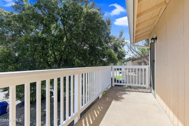 a view of a wooden fence