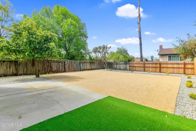 a view of a swimming pool and outdoor space
