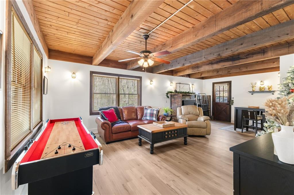 40 Kaceys Lane Helen, GA 30545 - Photo 22 of 35 a living room with furniture and wooden floor
