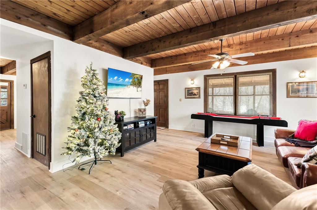 40 Kaceys Lane Helen, GA 30545 - Photo 23 of 35 a living room with furniture and a large window