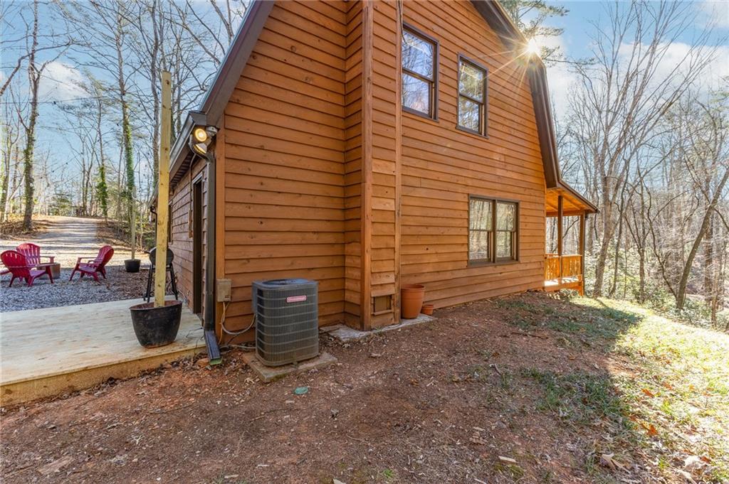 40 Kaceys Lane Helen, GA 30545 - Photo 8 of 35 a view of a house with a yard and garage