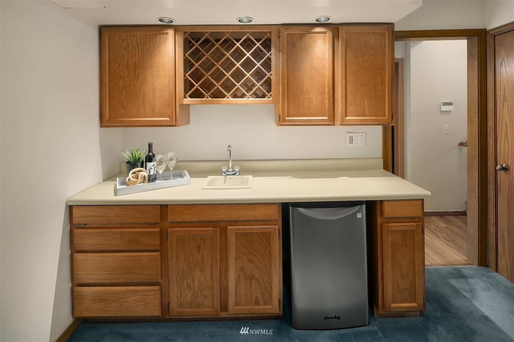 21832 Northeast 8th Street Sammamish, WA 98074 - Photo 25 of 40 a bathroom with a sink and a mirror