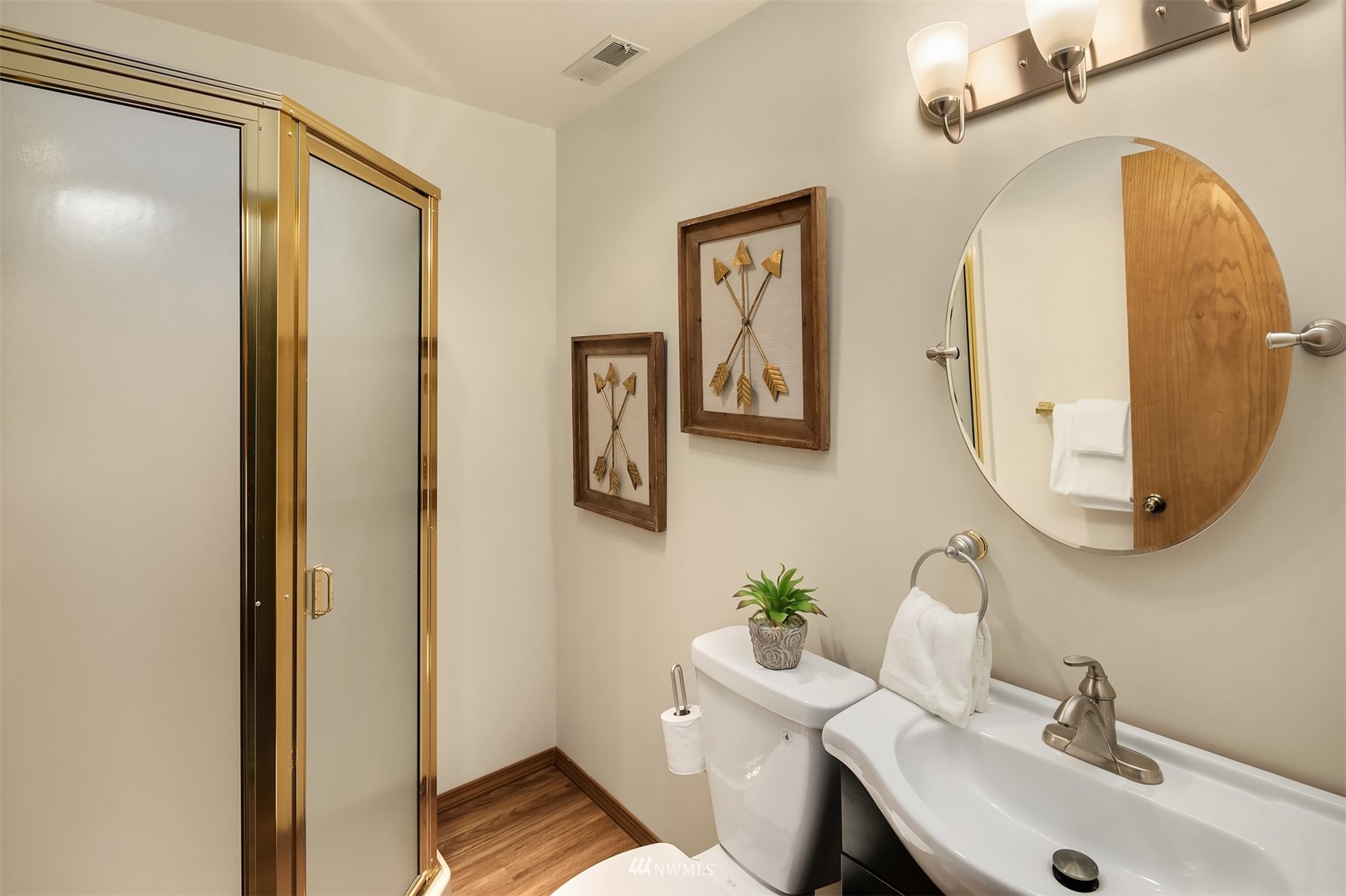 21832 Northeast 8th Street Sammamish, WA 98074 - Photo 26 of 40 a bathroom with a sink and a mirror