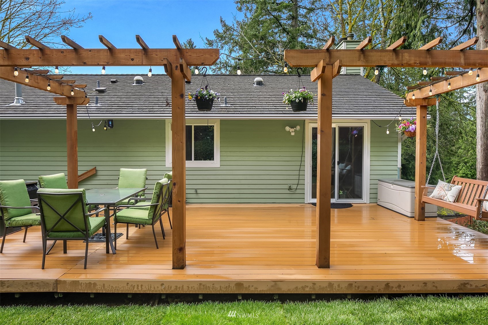 21832 Northeast 8th Street Sammamish, WA 98074 - Photo 30 of 40 a view of a house with backyard porch and sitting area