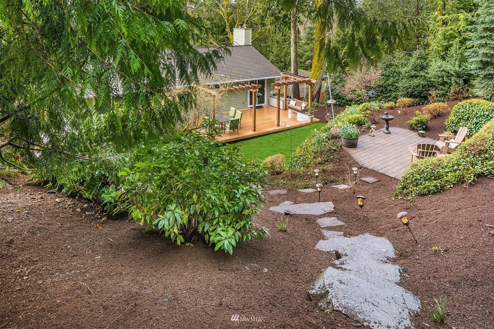 21832 Northeast 8th Street Sammamish, WA 98074 - Photo 34 of 40 a front view of a house with a yard and a street