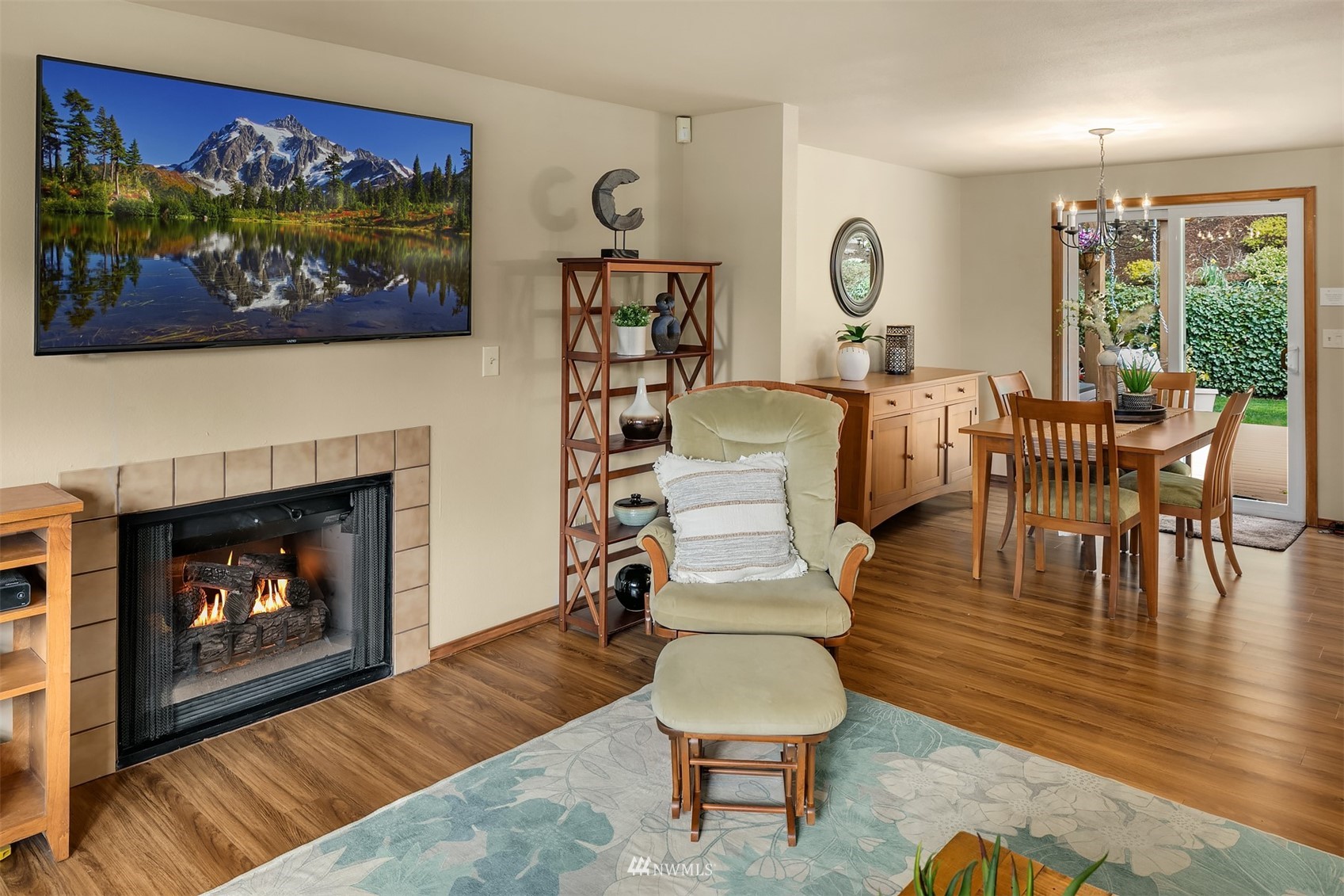 21832 Northeast 8th Street Sammamish, WA 98074 - Photo 5 of 40 a living room with furniture and a fireplace