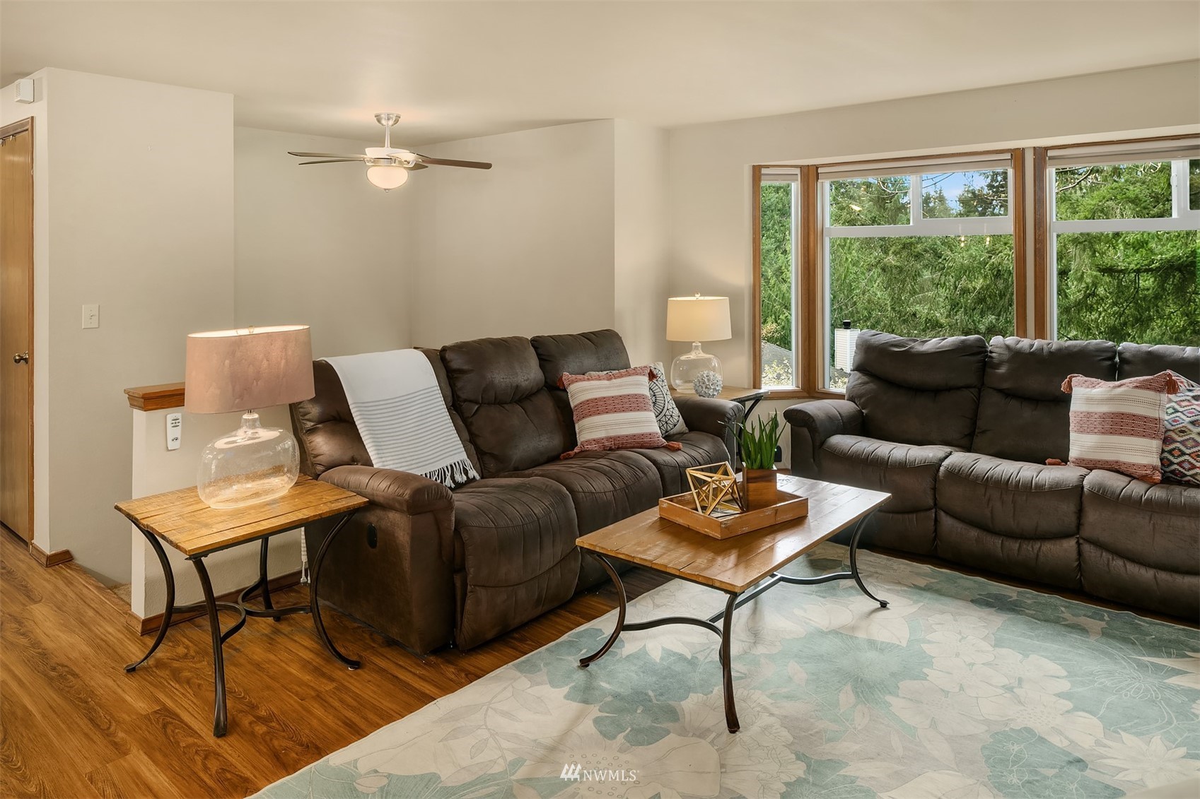 21832 Northeast 8th Street Sammamish, WA 98074 - Photo 6 of 40 a living room with furniture and a large window