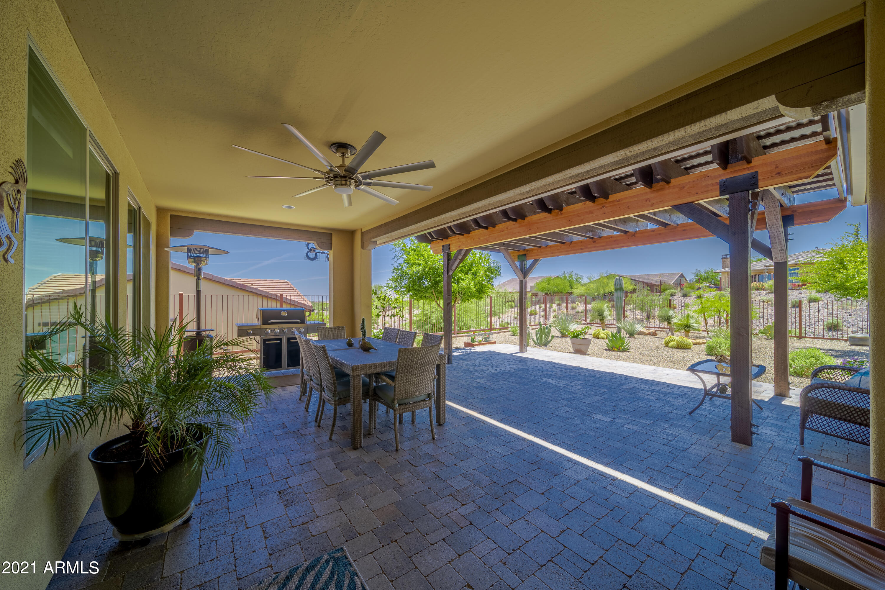 3301 Rising Sun Ridge Wickenburg, AZ 85390 - Photo 22 of 34 Covered patio with mature landscaping