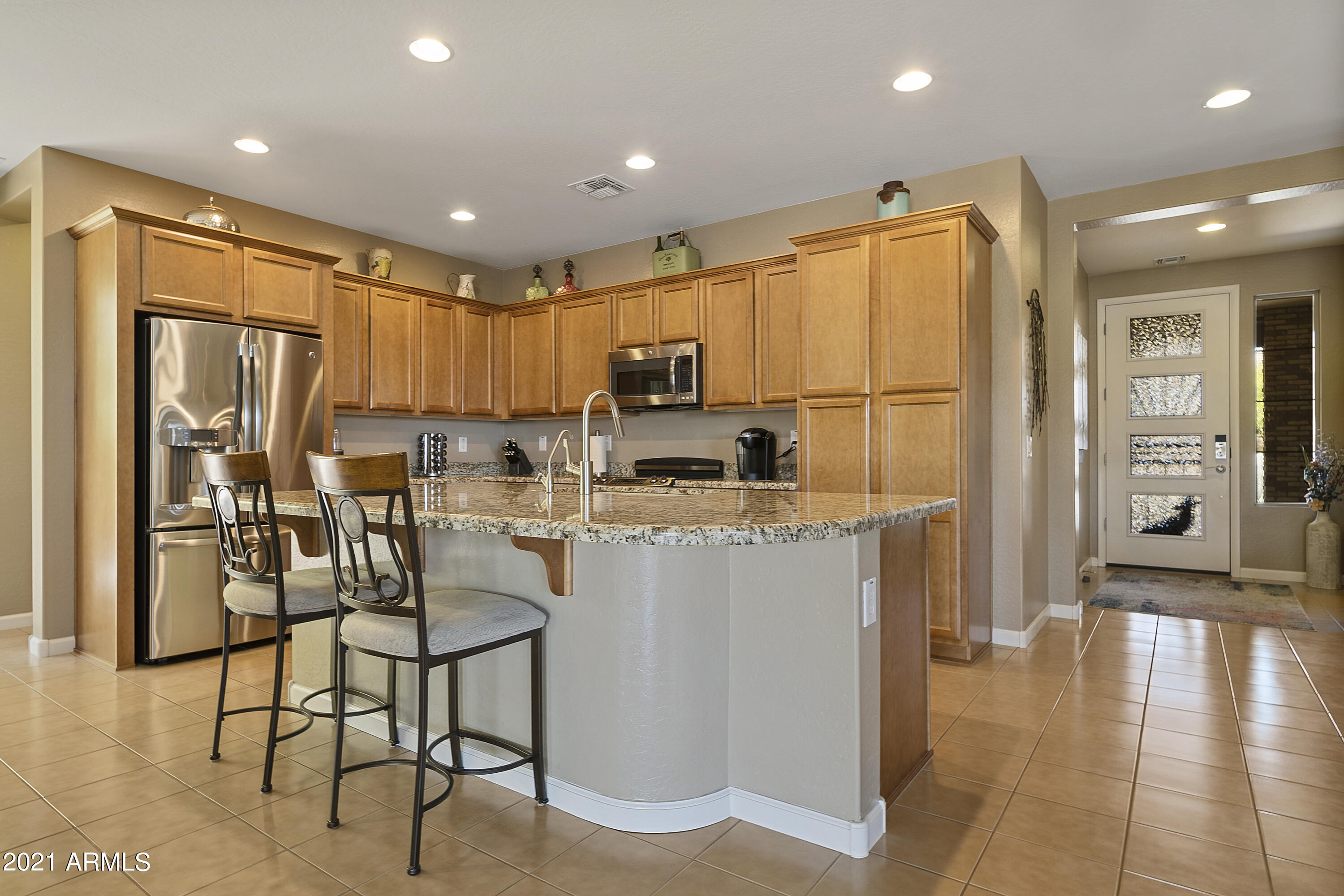 3301 Rising Sun Ridge Wickenburg, AZ 85390 - Photo 3 of 34 Open kitchen with island & breakfast bar
