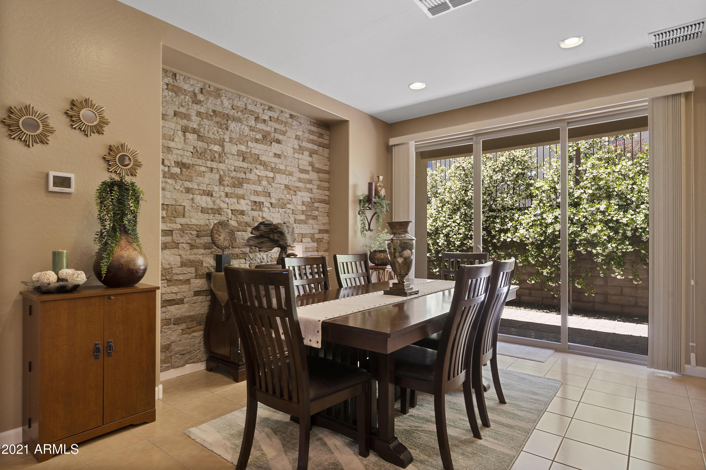 3301 Rising Sun Ridge Wickenburg, AZ 85390 - Photo 8 of 34 Dining area with feature wall