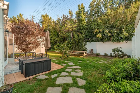 a garden view with a seating space