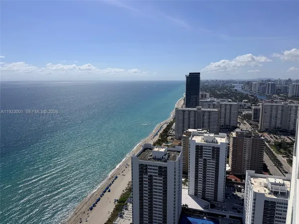 a view of a balcony with an ocean