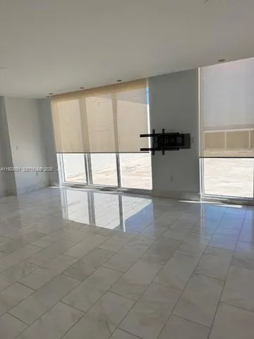 a view of kitchen with furniture and window