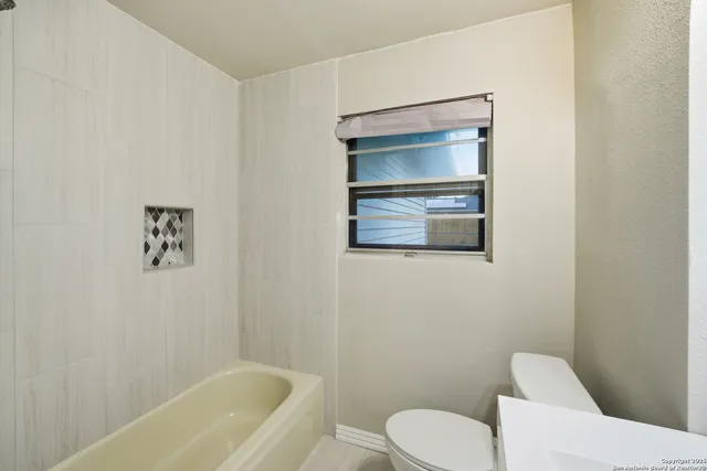 a bathroom with a bathtub