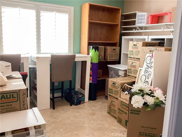 a utility room with a sink washer and dryer