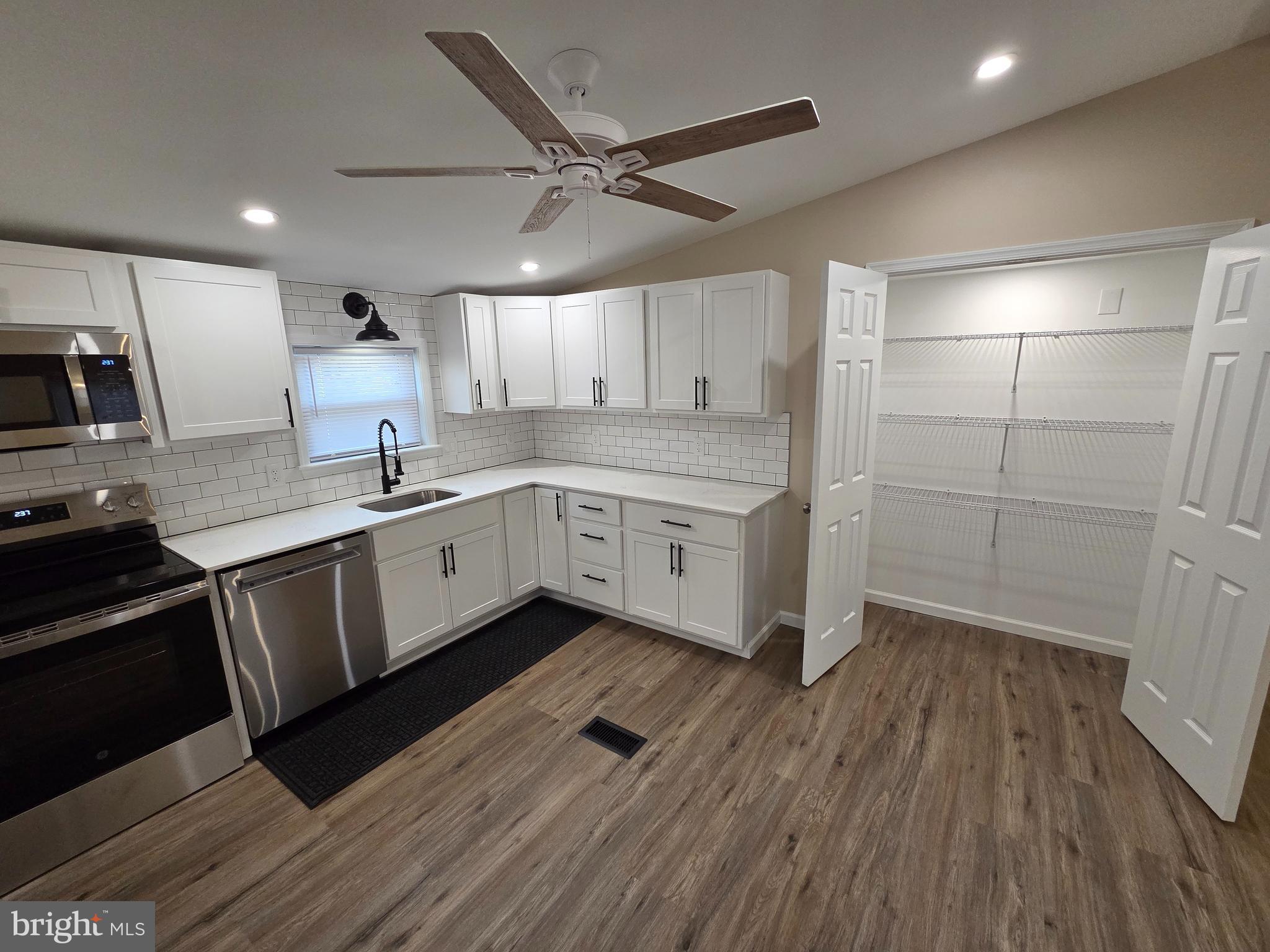 450 Ford Hook Road Doylestown, PA 18901 - Photo 9 of 21 a kitchen with a sink appliances and cabinets