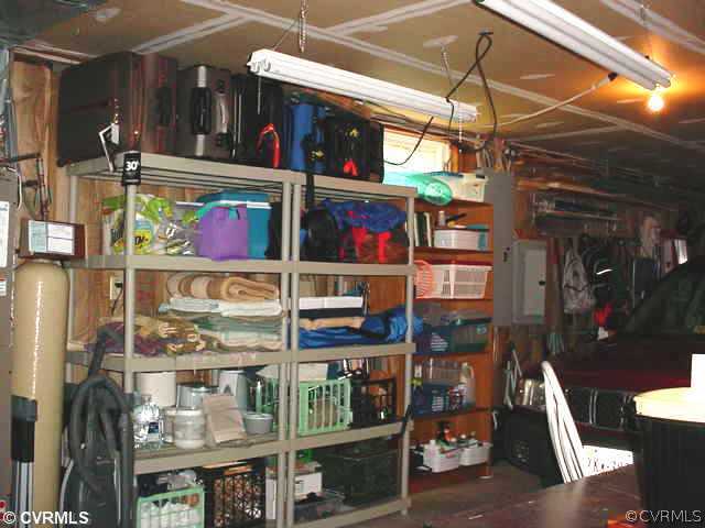 12286 Welling Hall Road Doswell, VA 23047 - Photo 22 of 24 Exterior Front - Garage storage shelves -