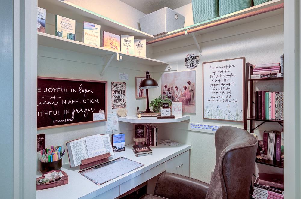 2555 West Bluff Avenue, Unit 152 Fresno, CA 93711 - Photo 31 of 45 a living room with furniture and paintings on the wall
