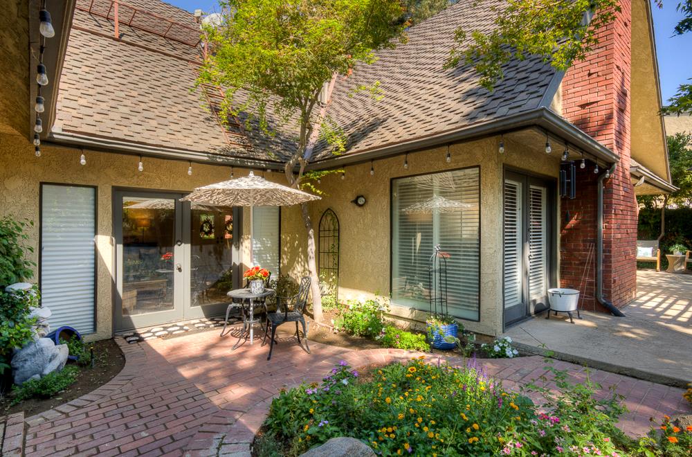 2555 West Bluff Avenue, Unit 152 Fresno, CA 93711 - Photo 40 of 45 a view of a house with sitting area and porch