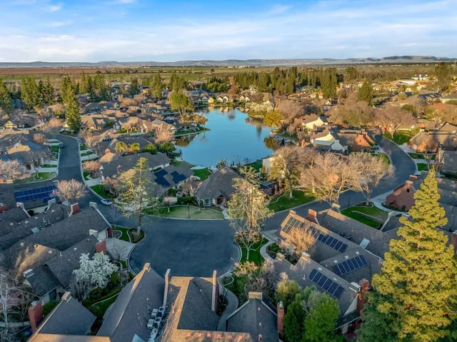 an aerial view of residential building with outdoor space