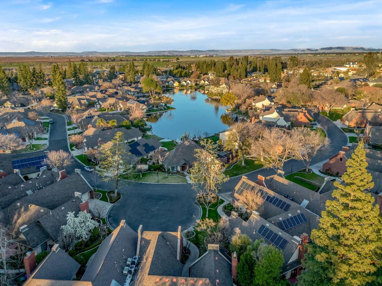 2555 West Bluff Avenue, Unit 152 Fresno, CA 93711 - Photo 45 of 45 an aerial view of residential building with outdoor space