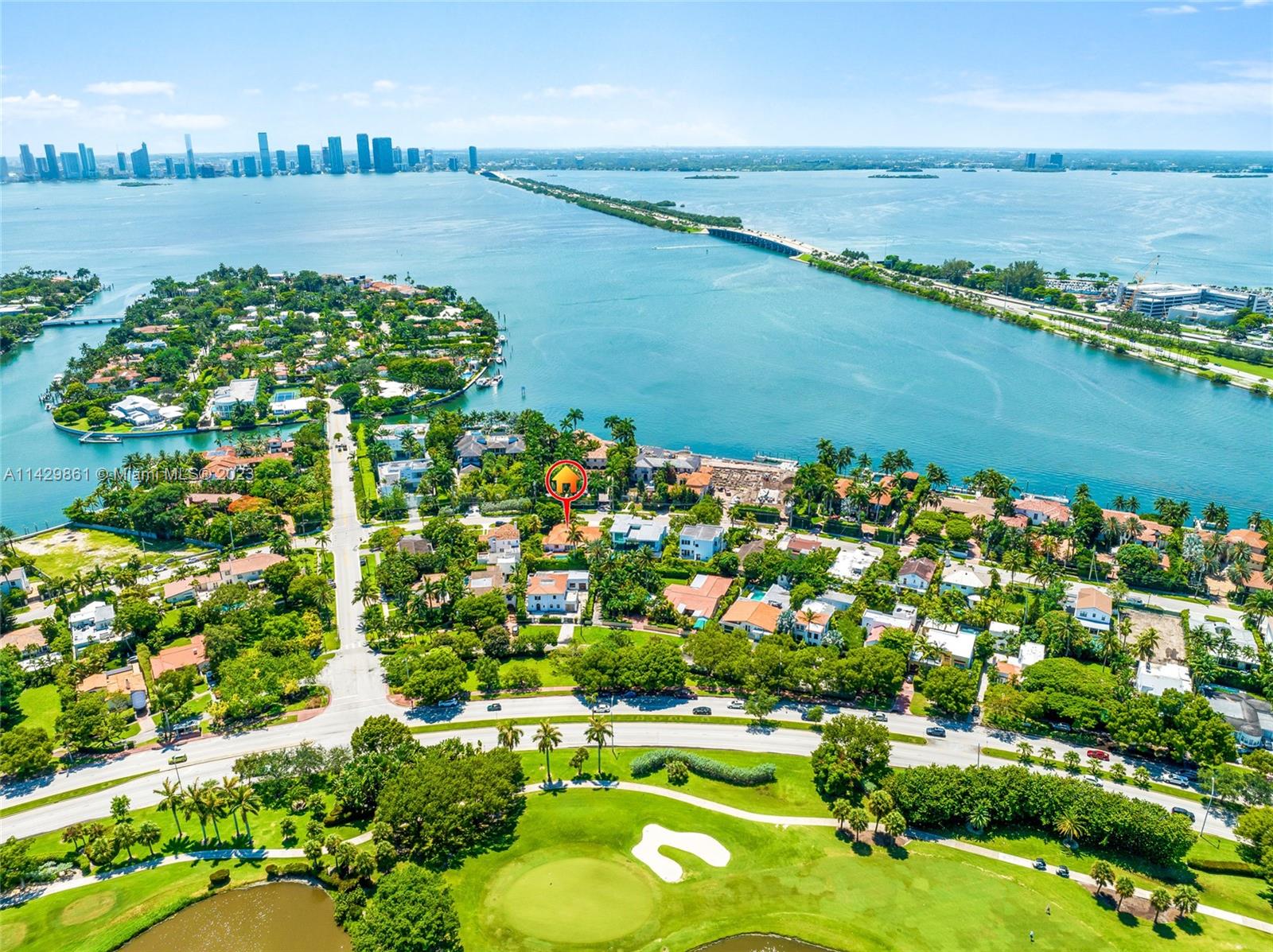 2935 North Bay Road Miami Beach, FL 33140 - Photo 6 of 27 a view of a lake with a city