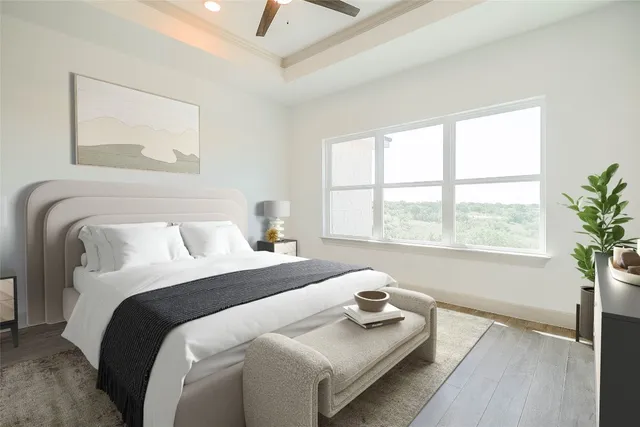 a bedroom with bed and a window