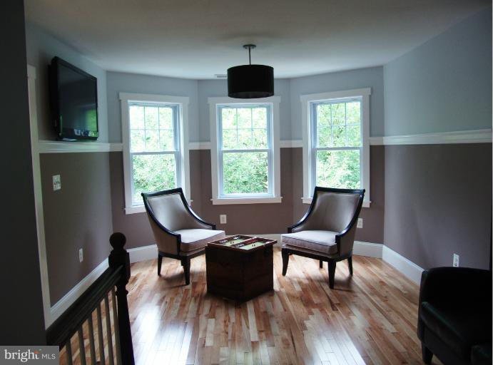 9131 Bradford Road Silver Spring, MD 20901 - Photo 6 of 30 Upper landing, family area