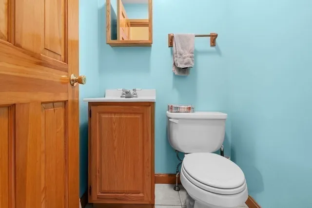 a bedroom with a bed and flat screen tv