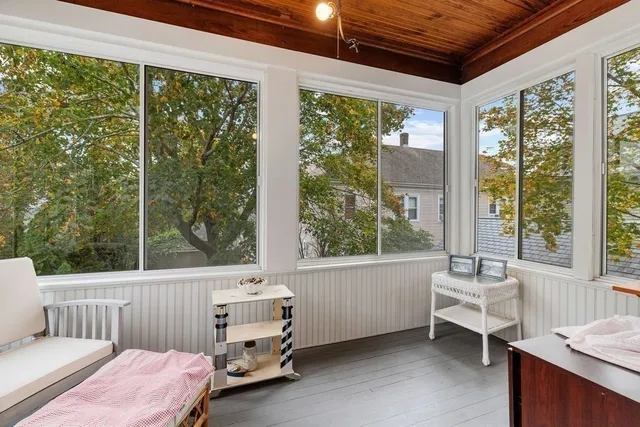 a bathroom with a bathtub and window