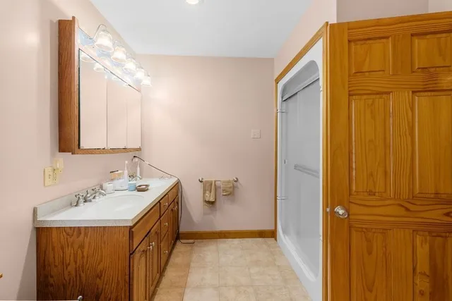 a room with a bed and a window