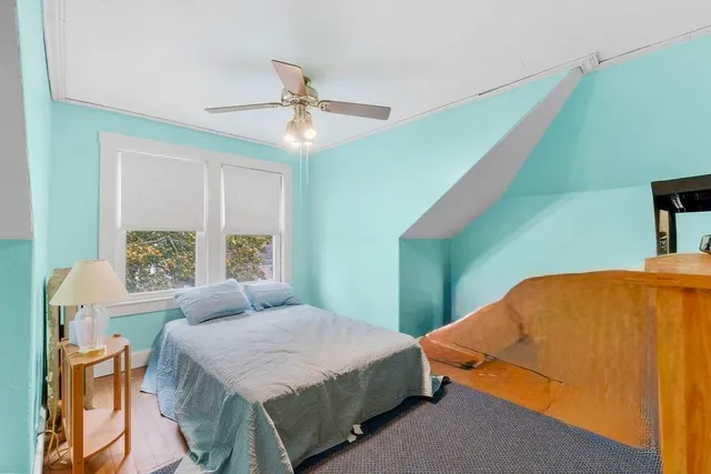 a view of a deck with table and chairs and wooden floor