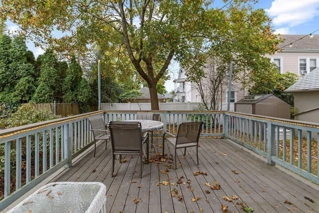 a view of a patio with couple of chairs and a couch