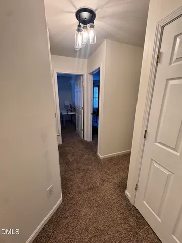 a view of a workspace with furniture