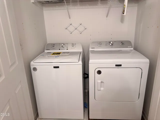 a view of a front door and a window