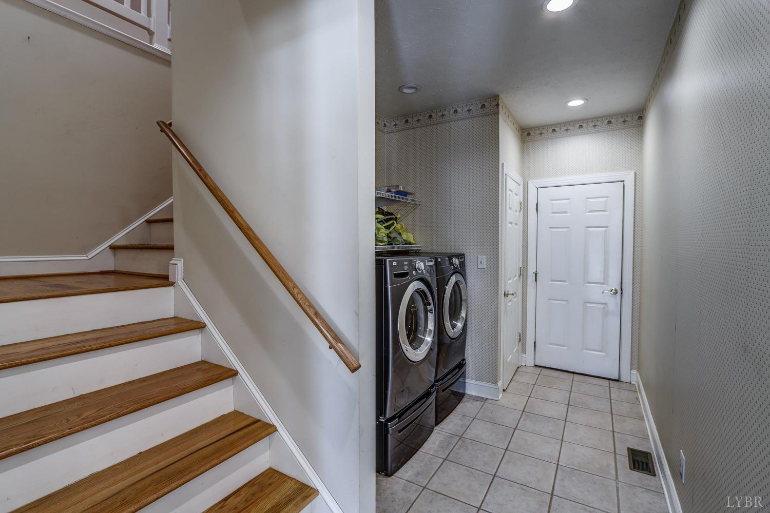 1835 Aspen Road Phenix, VA 23959 - Photo 24 of 84 a view of a hallway with washer and dryer